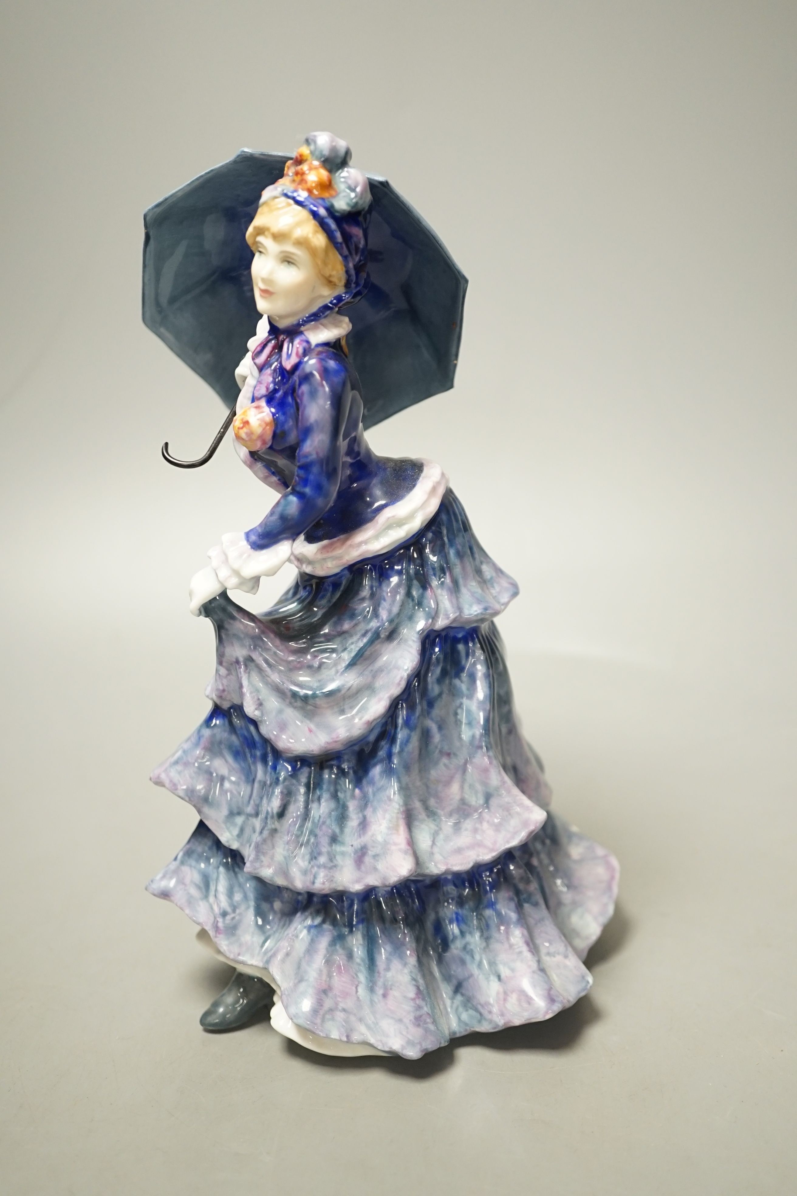 A Royal Doulton figure, Les Parapluies HN3473 - 20cm tall